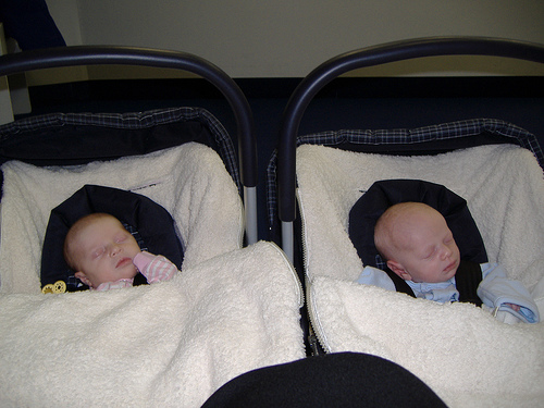 newborn twins in car seat