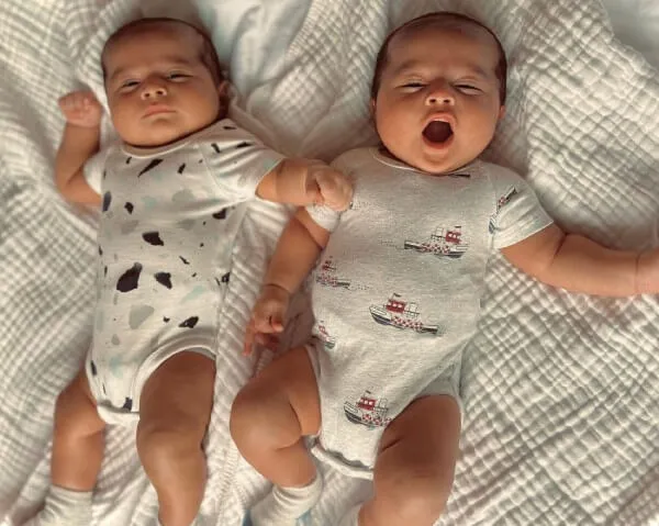 Twins sleeping hotsell in same crib